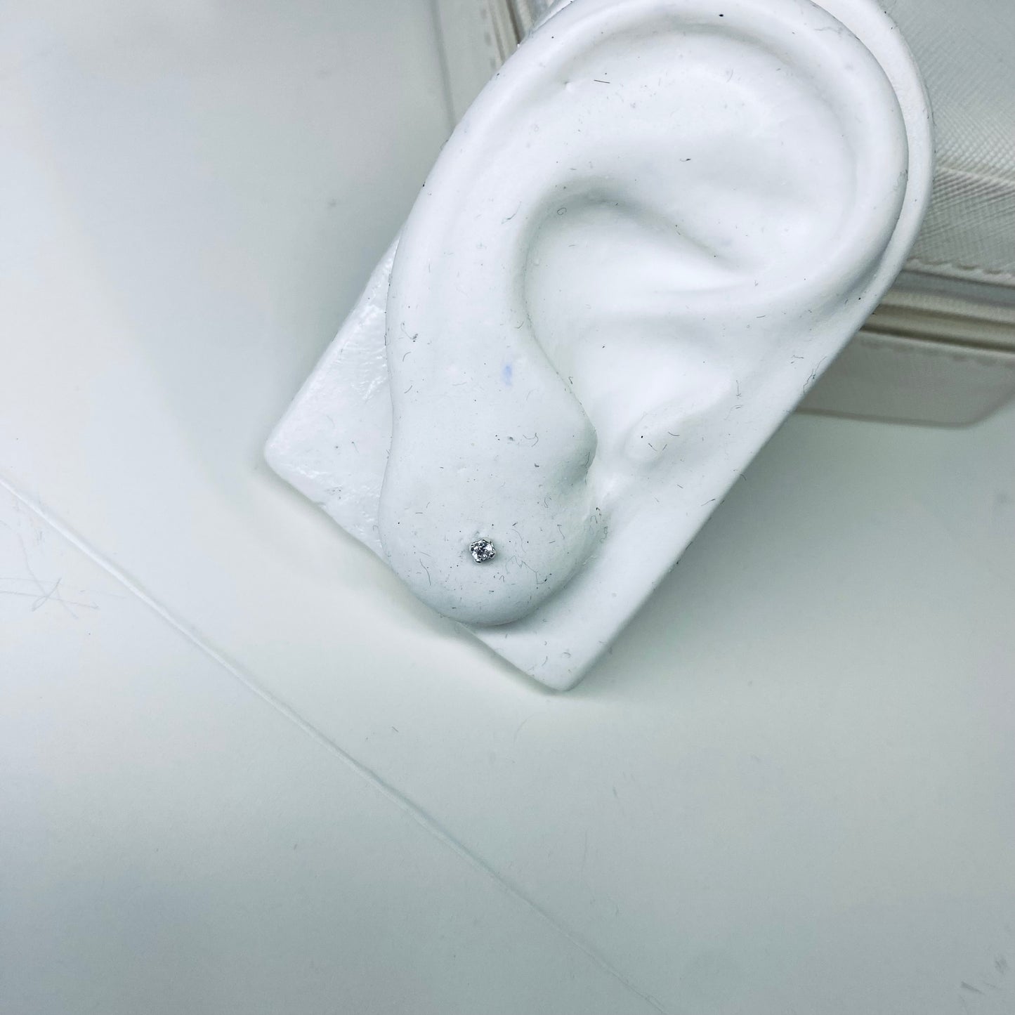 Brinco Ponto de Luz Baby