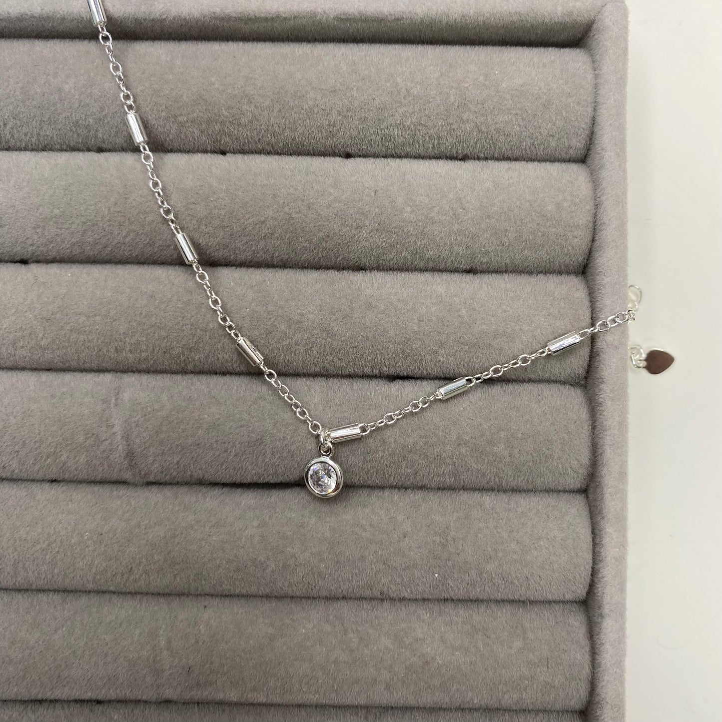 Pulseira de bastão e pingente